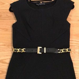 Chic gold brushed metal and black leather belt